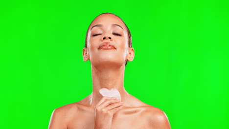 Gua-sha,-beauty-and-face-of-woman-on-green-screen
