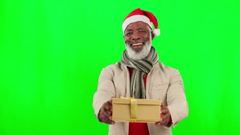 Christmas,-present-and-man-in-a-studio-with-green