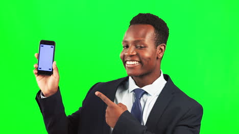 Phone,-mockup-and-man-in-studio-with-green-screen