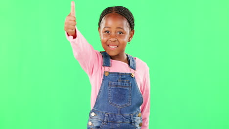 Little-girl,-face-and-thumbs-up-on-green-screen