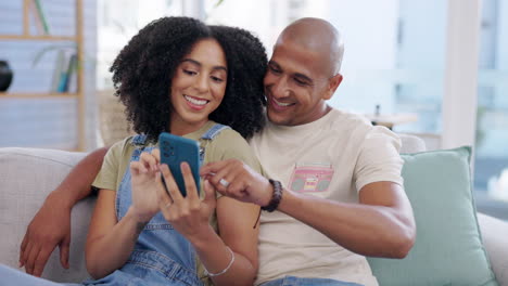 Phone,-couple-and-smile-on-sofa-in-living-room