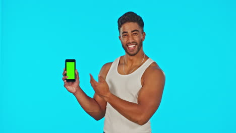 Face,-green-screen-and-man-with-phone-pointing