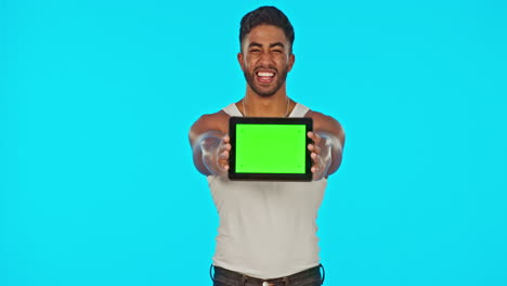 Face,-green-screen-and-man-with-tablet-laughing