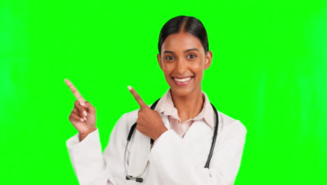 Happy,-pointing-and-doctor-in-studio-with-green