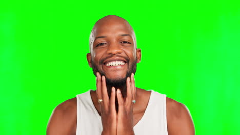 Black-man,-smile-and-touching-face-on-green-screen