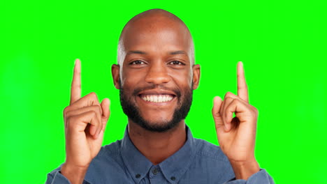 Green-screen-face,-studio-and-happy-man-pointing