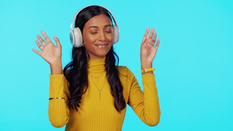 Woman,-music-and-headphones-with-dance-in-studio