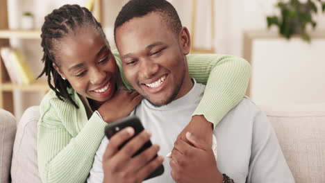Phone,-hug-and-happy-black-couple-reading-funny
