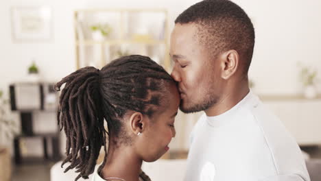 Love,-forehead-kiss-and-relax-black-couple