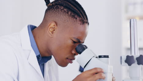 Science,-microscope-and-research-with-a-doctor-man