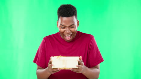 Excited,-black-man-face-and-gift-box-in-green