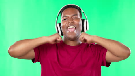 Face,-dance-and-black-man-with-headphones-on-green