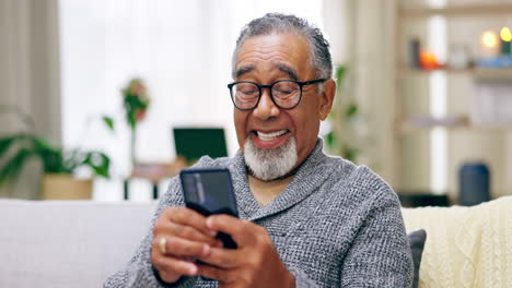 Relax,-phone-and-laugh-with-old-man-on-sofa