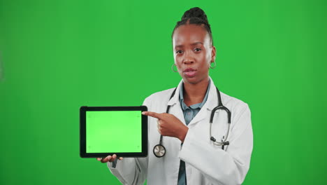 Doctor-pointing,-green-screen