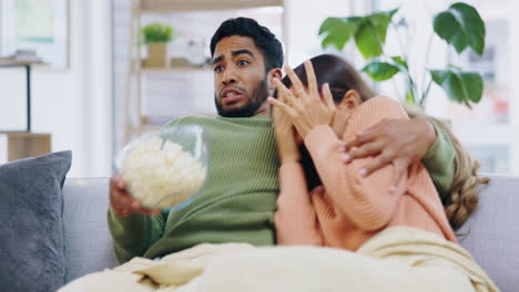 Date,-scary-movie-and-a-couple-with-popcorn