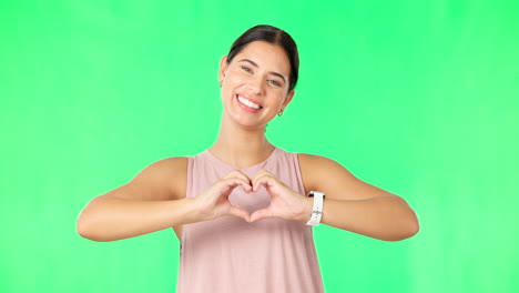 Heart,-hands-and-face-of-happy-woman-on-green