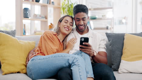 Couple,-smartphone-and-relax-on-sofa-with-social