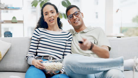 Movie,-talking-and-couple-at-home-on-a-living-room