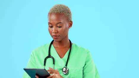 Tablet,-happy-and-black-woman-doctor-isolated