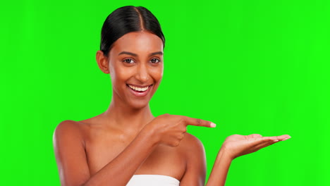 Skincare,-product-and-a-woman-pointing-on-a-green