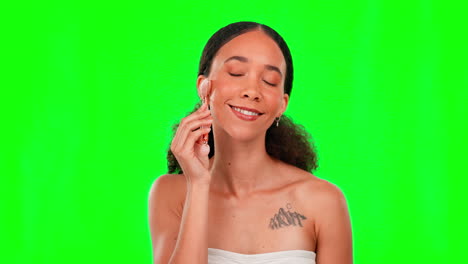 Face-roller,-skincare-and-woman-on-green-screen