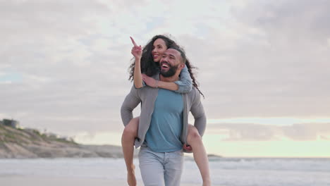 Piggy-back,-love-and-couple-on-beach-at-sunset