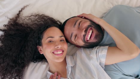 Love,-above-and-face-of-happy-couple-in-bed