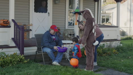 Wilson,-NY,-USA,-October-2021:-Children-in-festive-costumes-go-for-candy-on-Halloween-day