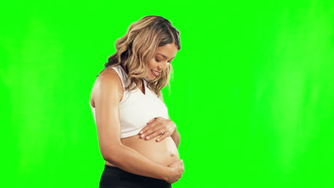 Stomach,-pregnant-and-a-happy-woman-on-a-green