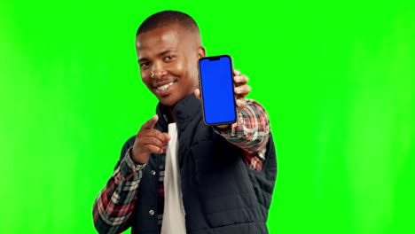 Black-man,-face-and-point-with-phone-by-green