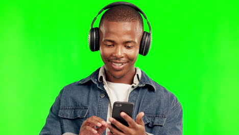 Phone,-music-headphones-and-black-man-on-green