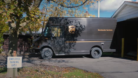 Lockport,-NY,-USA,-October-2021:-A-special-vehicle-of-the-UPS-postal-service-is-parked-in-front-of-the-post-office