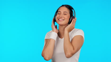 Music,-headphones-and-woman-dance-in-studio-happy