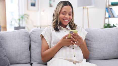 Happy-woman,-sofa-and-phone-text-at-home