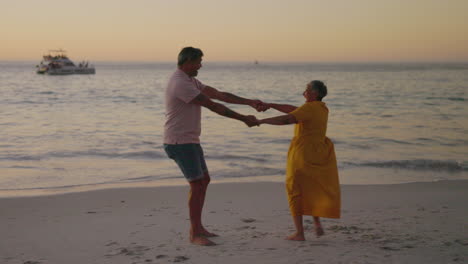 Love,-couple-dance-at-beach