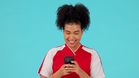Phone,-soccer-and-smile-with-woman-in-studio