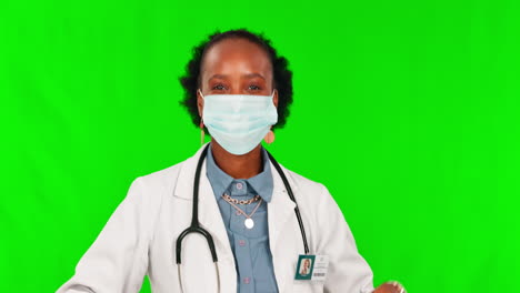 Thumbs-up,-mask-and-a-doctor-black-woman-on-green