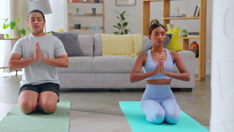 Yoga,-meditation-and-zen,-couple-in-living-room