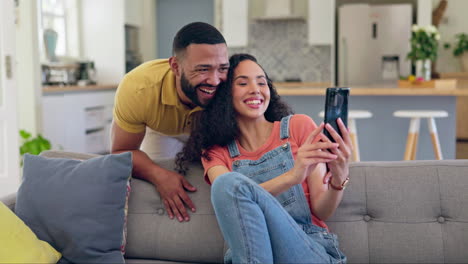 Couple,-sofa-and-greeting-on-video-call