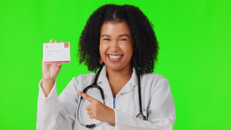 Pointing,-green-screen-or-happy-woman-doctor