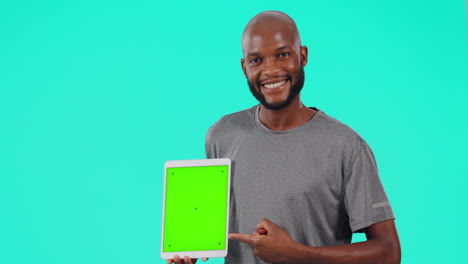Black-man,-tablet-and-pointing-to-mockup-on-green