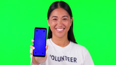 Phone,-green-screen-and-portrait-of-volunteer