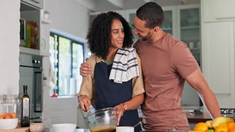 Couple,-hug-and-happy-cooking-in-kitchen-for-love