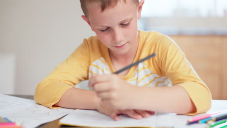 Home-education,-writing-and-boy-or-child-learning