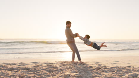 Summer,-beach-and-a-man-swinging-his-son-outdoor