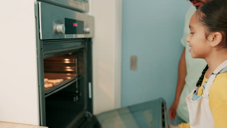 Father,-girl-and-baking-oven-for-cooking