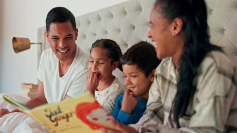 Mom,-dad-and-happy-kids-in-bedroom-with-reading
