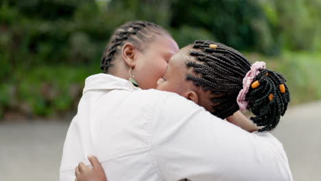 Black-woman,-hug-and-daughter-with-love-at-park