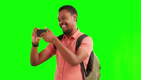 Green-screen,-phone-and-black-man-taking-picture