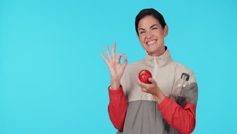 Fitness,-okay-and-a-woman-with-an-apple